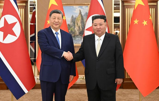 Xi Jinping Kim Jong Un laugh